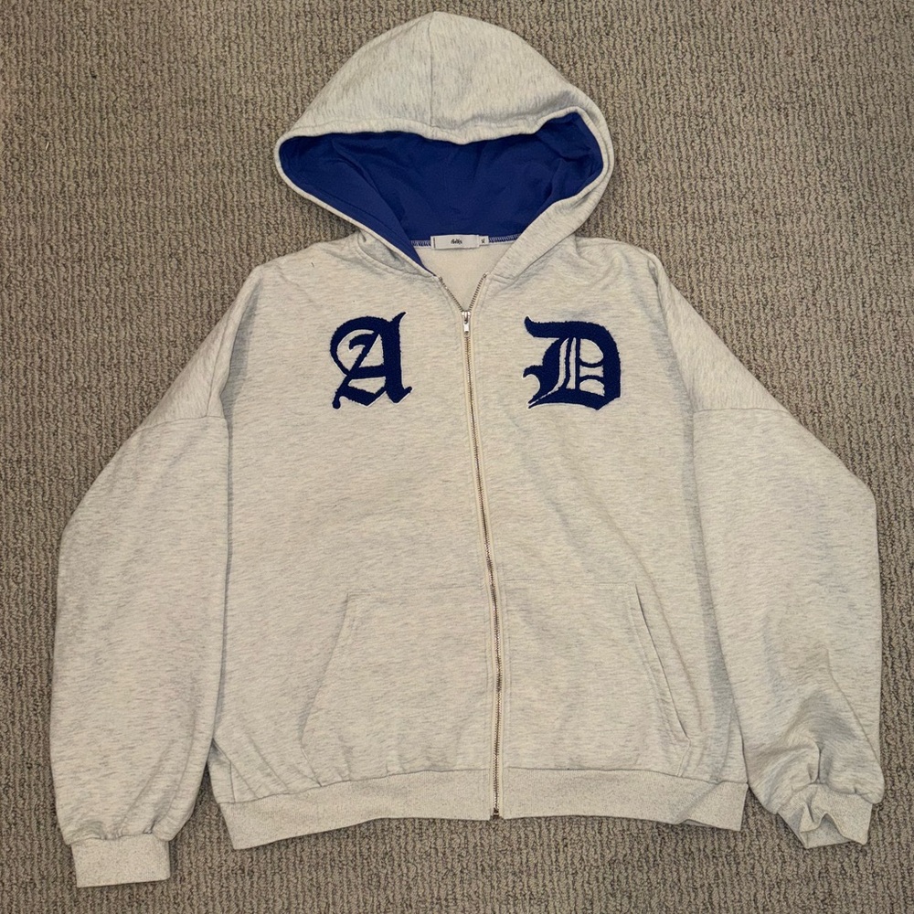 Grey and blue zip up hoodie